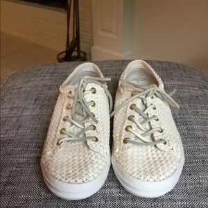 Women’s ivory leather woven tennis shoe